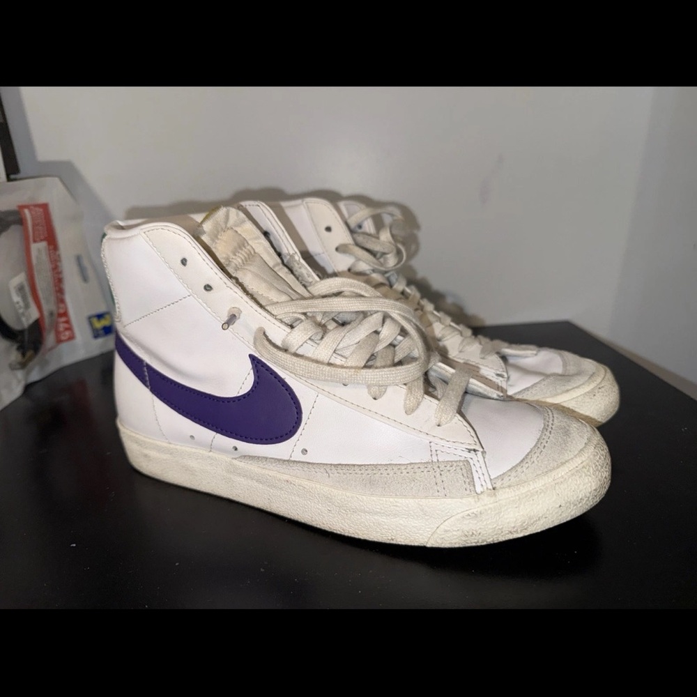 Nike White High-Top Sneakers with Purple Swoosh